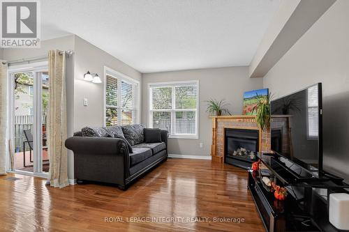 35 Heartleaf Private, Ottawa, ON - Indoor Photo Showing Living Room With Fireplace