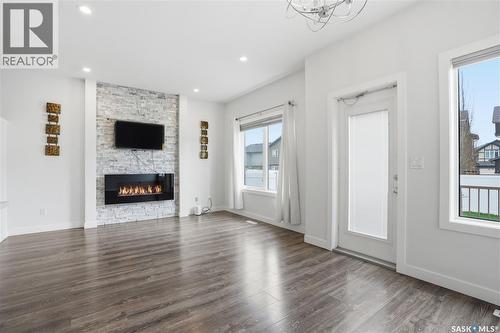 234 Brighton Gate, Saskatoon, SK - Indoor Photo Showing Living Room With Fireplace