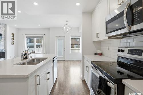 234 Brighton Gate, Saskatoon, SK - Indoor Photo Showing Kitchen With Double Sink With Upgraded Kitchen
