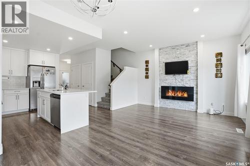 234 Brighton Gate, Saskatoon, SK - Indoor With Fireplace