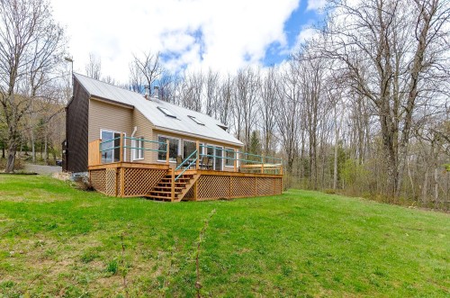 Back of Structure - 171 Ch. Holmes, Sutton, QC - Outdoor With Deck Patio Veranda