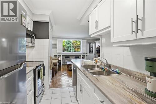 482 James Street N Unit# 104, Hamilton, ON - Indoor Photo Showing Kitchen With Double Sink
