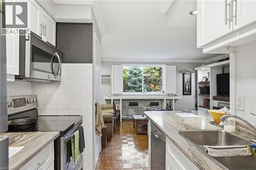482 James Street N Unit# 104, Hamilton, ON - Indoor Photo Showing Kitchen With Double Sink