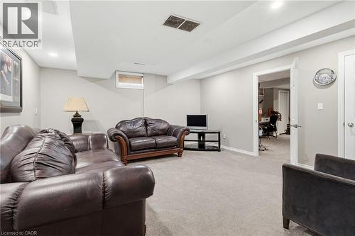 Carpeted recreation room with recessed lighting and a drop ceiling - 47 Hannah Crescent, Hamilton, ON - Indoor