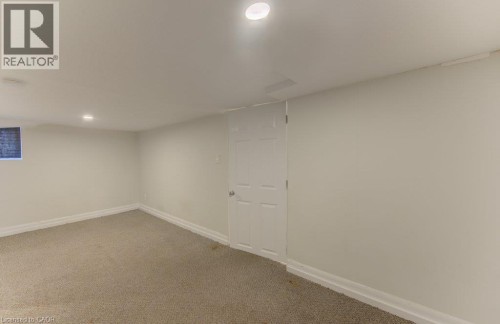 Recessed lighting, light-colored walls, and carpeted flooring - 10 Marshall Street, Waterloo, ON 