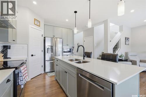 1019 Childers Court, Saskatoon, SK - Indoor Photo Showing Kitchen With Double Sink With Upgraded Kitchen