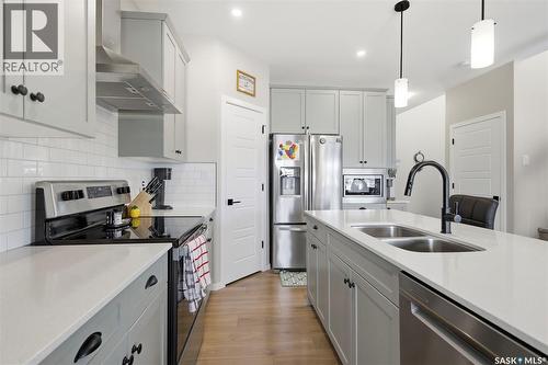 1019 Childers Court, Saskatoon, SK - Indoor Photo Showing Kitchen With Double Sink With Upgraded Kitchen