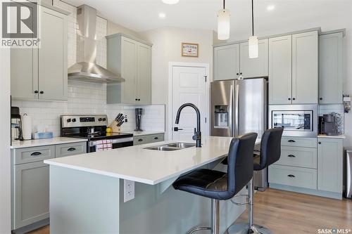 1019 Childers Court, Saskatoon, SK - Indoor Photo Showing Kitchen With Double Sink With Upgraded Kitchen