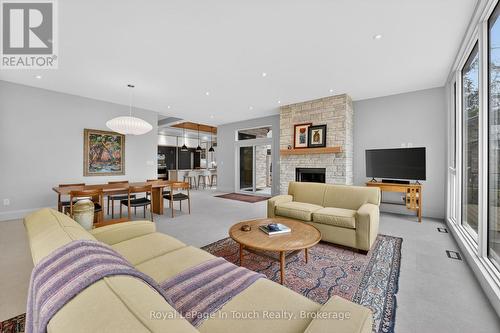 160 Tiny Beaches Road N, Tiny, ON - Indoor Photo Showing Living Room With Fireplace