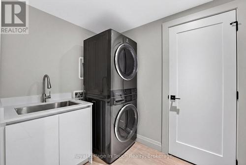 Virtually Staged - 160 Tiny Beaches Road N, Tiny, ON - Indoor Photo Showing Laundry Room