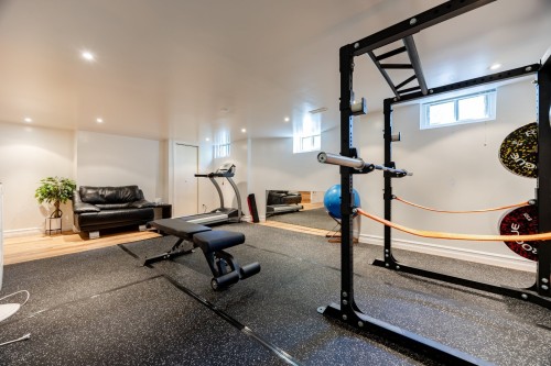 Salle familiale - 33 Rue Thurlow, Hampstead, QC - Indoor Photo Showing Gym Room