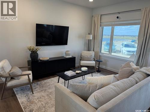 75 Taskamanwa Terrace, Saskatoon, SK - Indoor Photo Showing Living Room