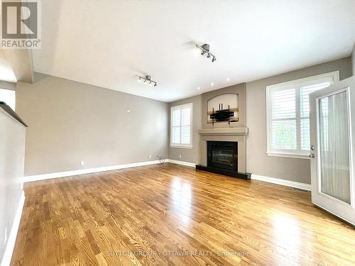 1520 Arnhem Street, Ottawa, ON - Indoor Photo Showing Living Room With Fireplace