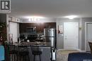 404 820 5Th Street Ne, Weyburn, SK  - Indoor Photo Showing Kitchen With Double Sink 