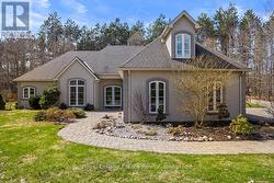 38 COPELAND CREEK DRIVE  Tiny, ON L9M 0M3