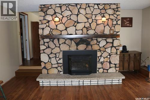 211 Pipestone Avenue, Wawota, SK - Indoor Photo Showing Living Room With Fireplace
