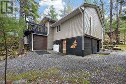 Side - Garage (under deck) - 