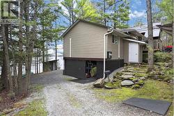 Side Yard (snowmobile basement storage) - 