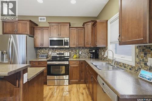 234 Klassen Crescent, Saskatoon, SK - Indoor Photo Showing Kitchen With Double Sink