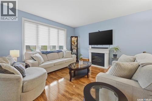 234 Klassen Crescent, Saskatoon, SK - Indoor Photo Showing Living Room With Fireplace