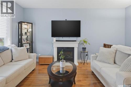 234 Klassen Crescent, Saskatoon, SK - Indoor Photo Showing Living Room With Fireplace