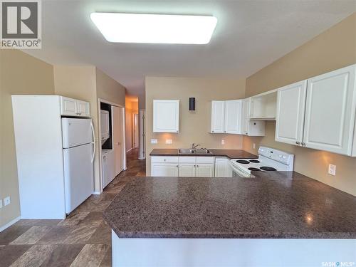 105 Main Street, Wawota, SK - Indoor Photo Showing Kitchen With Double Sink