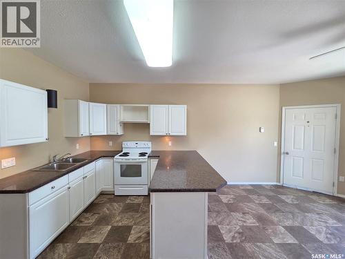 105 Main Street, Wawota, SK - Indoor Photo Showing Kitchen With Double Sink