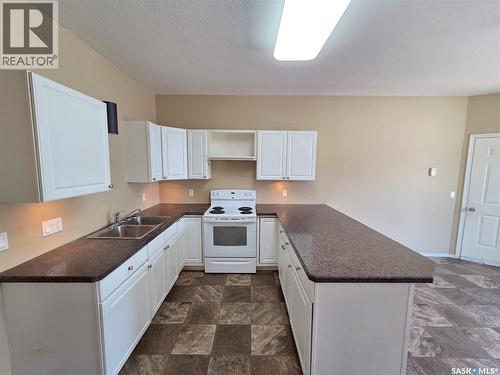 105 Main Street, Wawota, SK - Indoor Photo Showing Kitchen With Double Sink