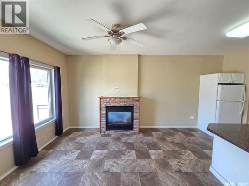 105 Main Street, Wawota, SK - Indoor Photo Showing Other Room With Fireplace