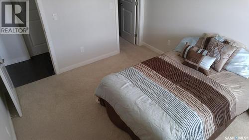 207 211 Ledingham Street, Saskatoon, SK - Indoor Photo Showing Bedroom