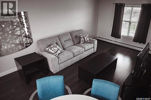 207 211 Ledingham Street, Saskatoon, SK - Indoor Photo Showing Living Room