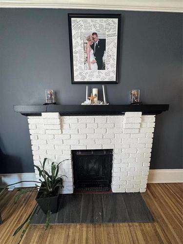 450 3Rd Street, Brandon, MB - Indoor With Fireplace
