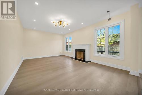 5016 Natkarni Crescent, Mississauga, ON - Indoor Photo Showing Living Room With Fireplace