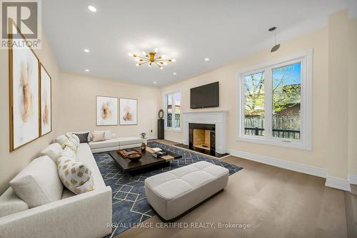 5016 Natkarni Crescent, Mississauga, ON - Indoor Photo Showing Living Room With Fireplace