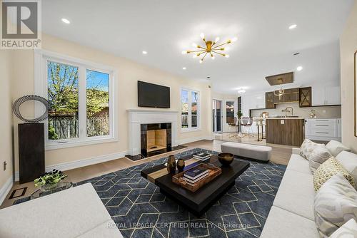 5016 Natkarni Crescent, Mississauga, ON - Indoor Photo Showing Living Room With Fireplace