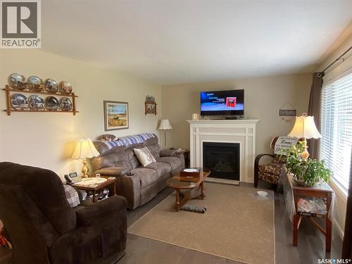 536 Stanley Street, Esterhazy, SK - Indoor Photo Showing Living Room With Fireplace