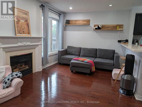 Family Room - 434 Heddle Crescent, Newmarket, ON - Indoor Photo Showing Living Room With Fireplace