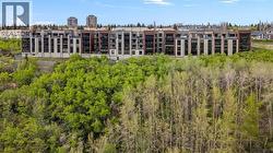 209, 15 Cougar Ridge Landing SW  Calgary, AB T3H 6C3