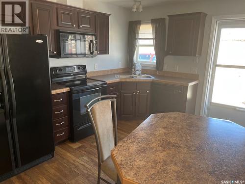 320 3Rd Avenue W, Christopher Lake, SK - Indoor Photo Showing Kitchen With Double Sink