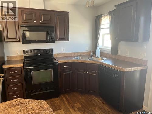 320 3Rd Avenue W, Christopher Lake, SK - Indoor Photo Showing Kitchen With Double Sink