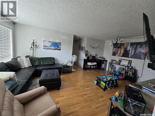 9 605 Wilson Crescent, Saskatoon, SK - Indoor Photo Showing Living Room