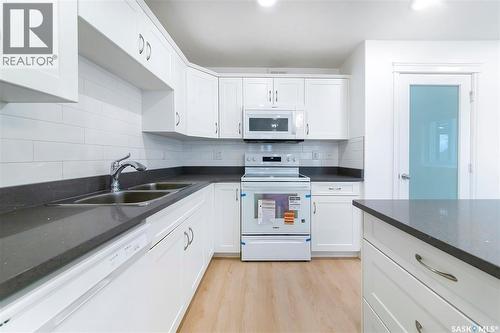 501 110 Akhtar Bend, Saskatoon, SK - Indoor Photo Showing Kitchen With Double Sink