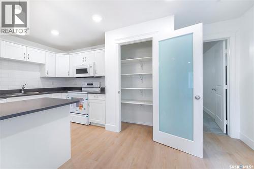 501 110 Akhtar Bend, Saskatoon, SK - Indoor Photo Showing Kitchen With Double Sink
