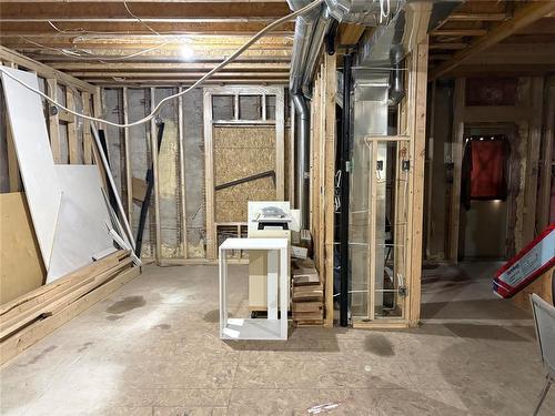 Livingroom off of kitchen - 108 Hossack Avenue, Killarney, MB - Indoor Photo Showing Basement