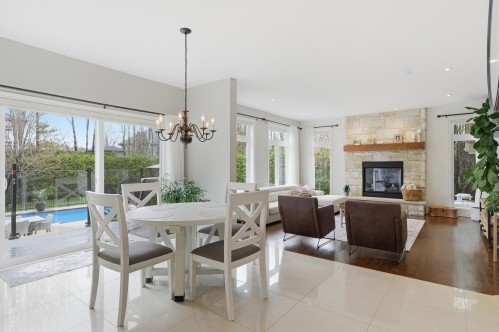 Cuisine - 16500 Rue Du Jade, Mirabel, QC - Indoor Photo Showing Dining Room With Fireplace
