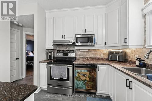 101 - 222 First Street E, Cornwall, ON - Indoor Photo Showing Kitchen With Double Sink