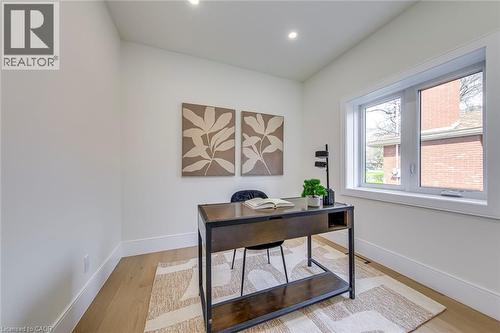 Bright room featuring a large window, recessed lighting, and wood-finish flooring - 1411 Mountain Grove Avenue, Burlington, ON - Indoor Photo Showing Office