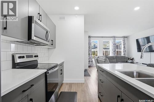 187 Rosewood Boulevard E, Saskatoon, SK - Indoor Photo Showing Kitchen With Double Sink