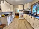 451 Woodlawn Crescent, Weyburn, SK  - Indoor Photo Showing Kitchen With Double Sink 