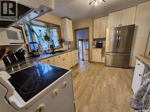 451 Woodlawn Crescent, Weyburn, SK - Indoor Photo Showing Kitchen With Double Sink